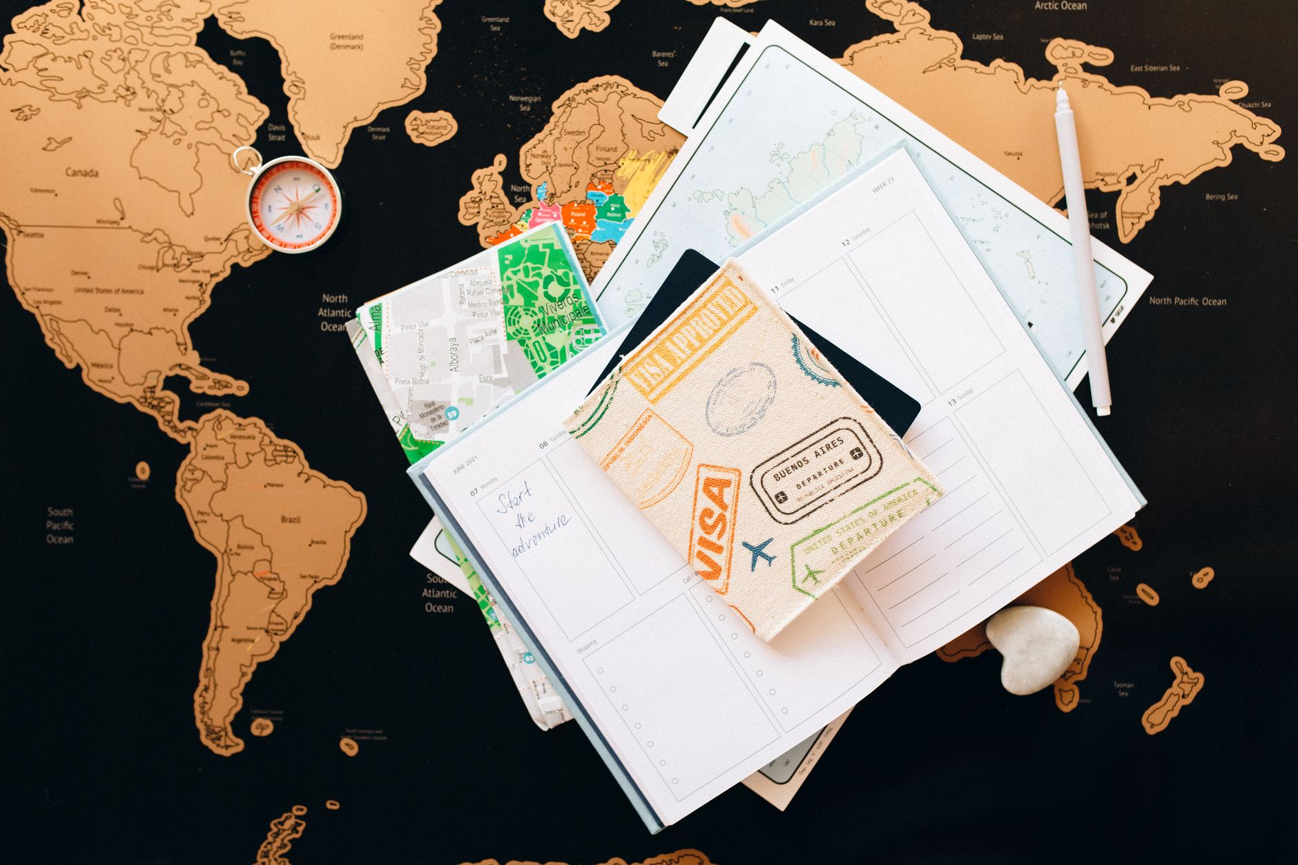 Custom itinerary notebook and travel maps